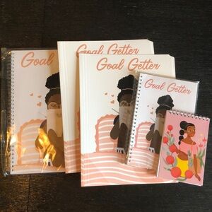 1 spiral note book, 2 folders, 2 small note pads